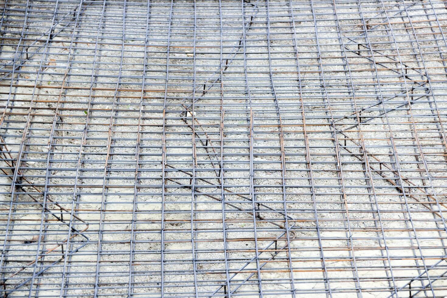 Background of reinforcing steel bars for building armature. Steel reinforcement in the construction of the building photo