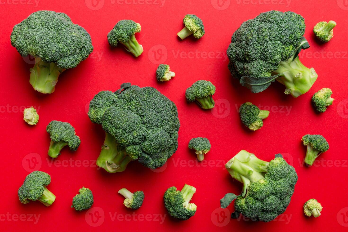 green fresh broccoli background close up on colored table. Vegetables for diet and healthy eating. Organic food photo