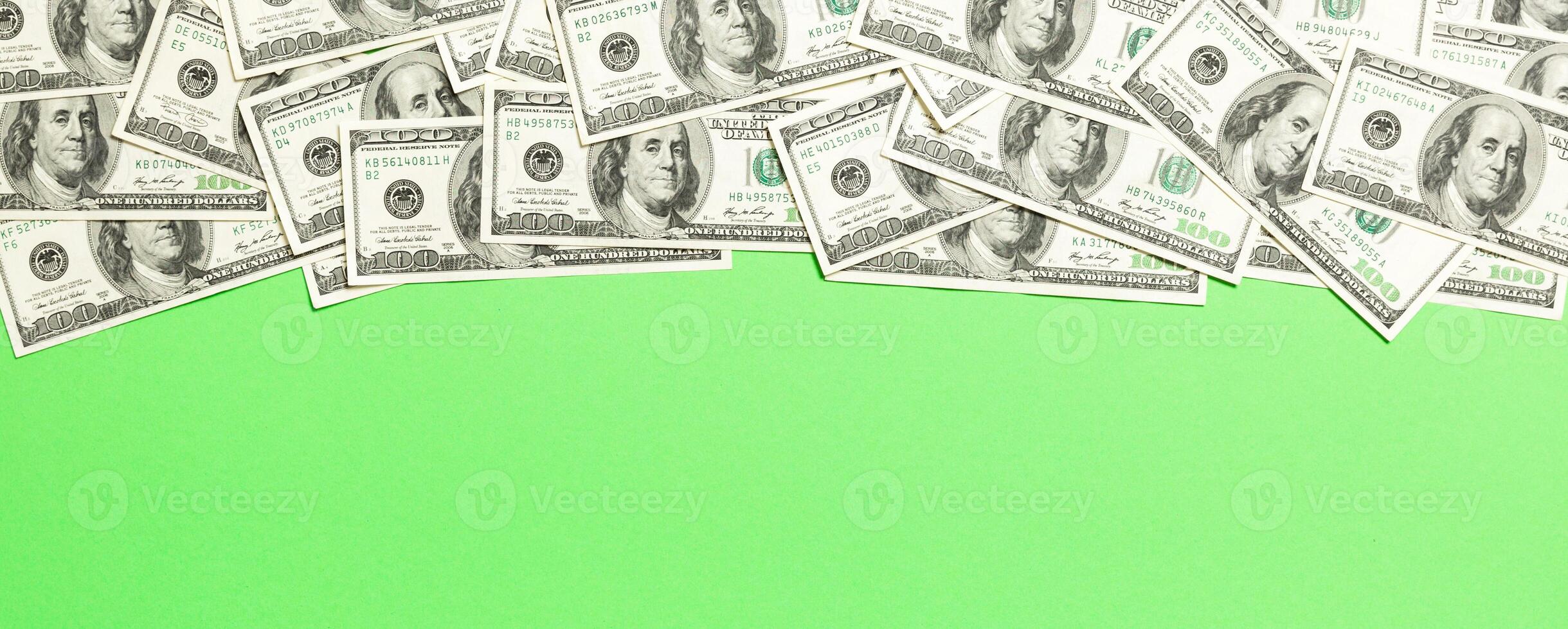 dollar bills a on a light colored background. copy space, top view business concept photo