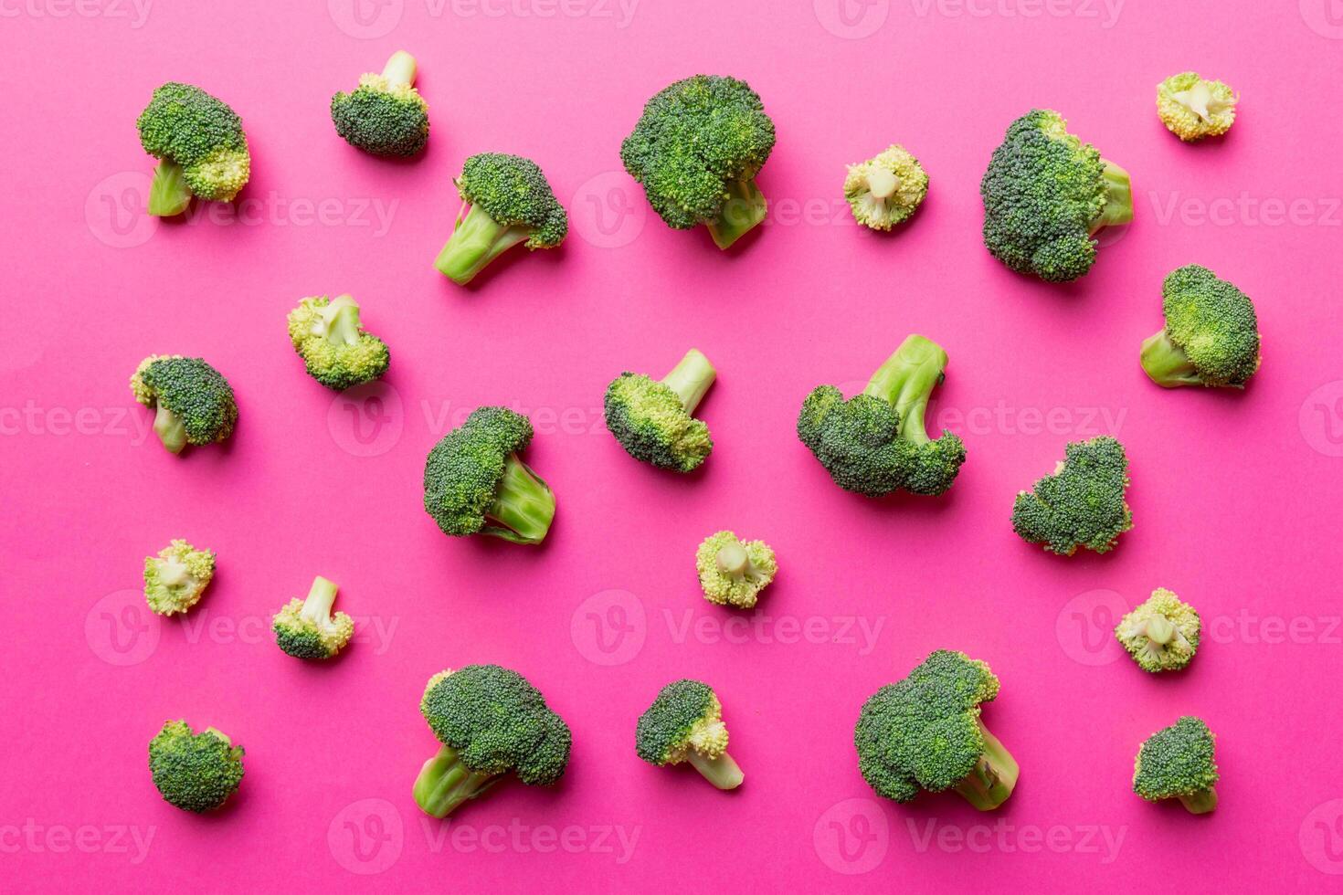green fresh broccoli background close up on colored table. Vegetables for diet and healthy eating. Organic food photo