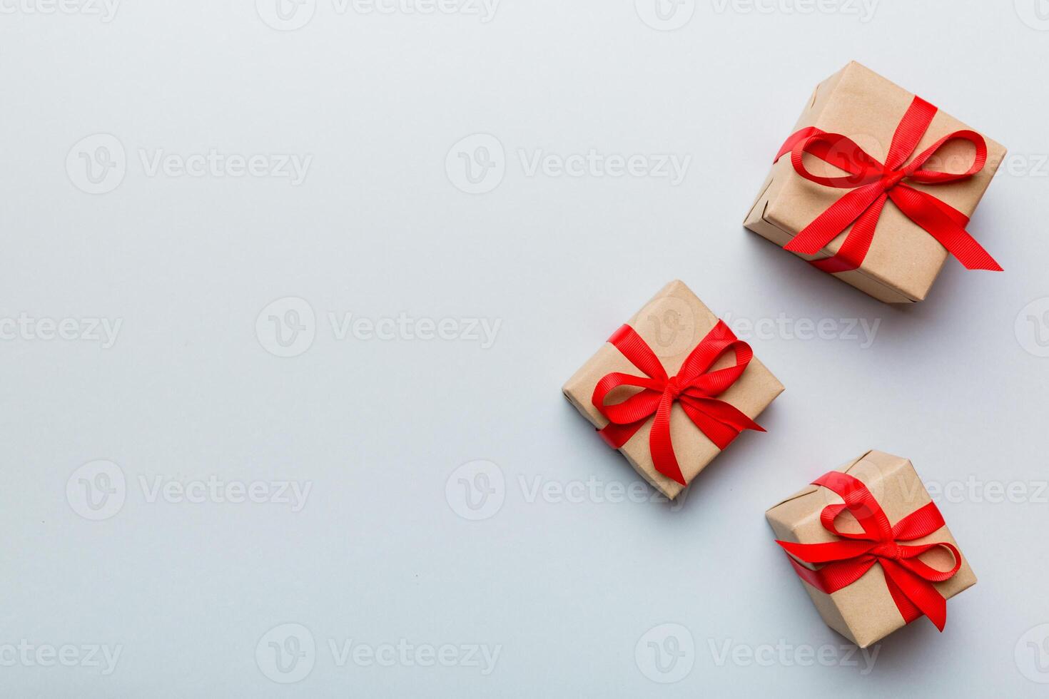 Valentine day composition Background red gift box with bow and heart. Christmas present. View from above. Holday greeting card photo