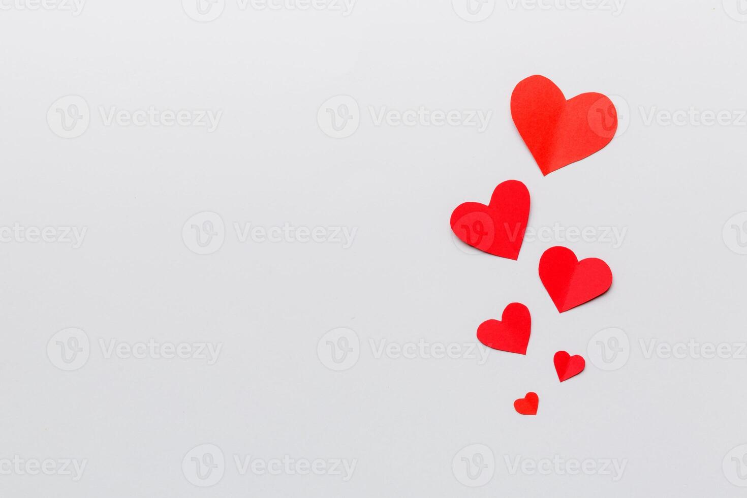Valentine day background with red hearts, top view with copy space photo
