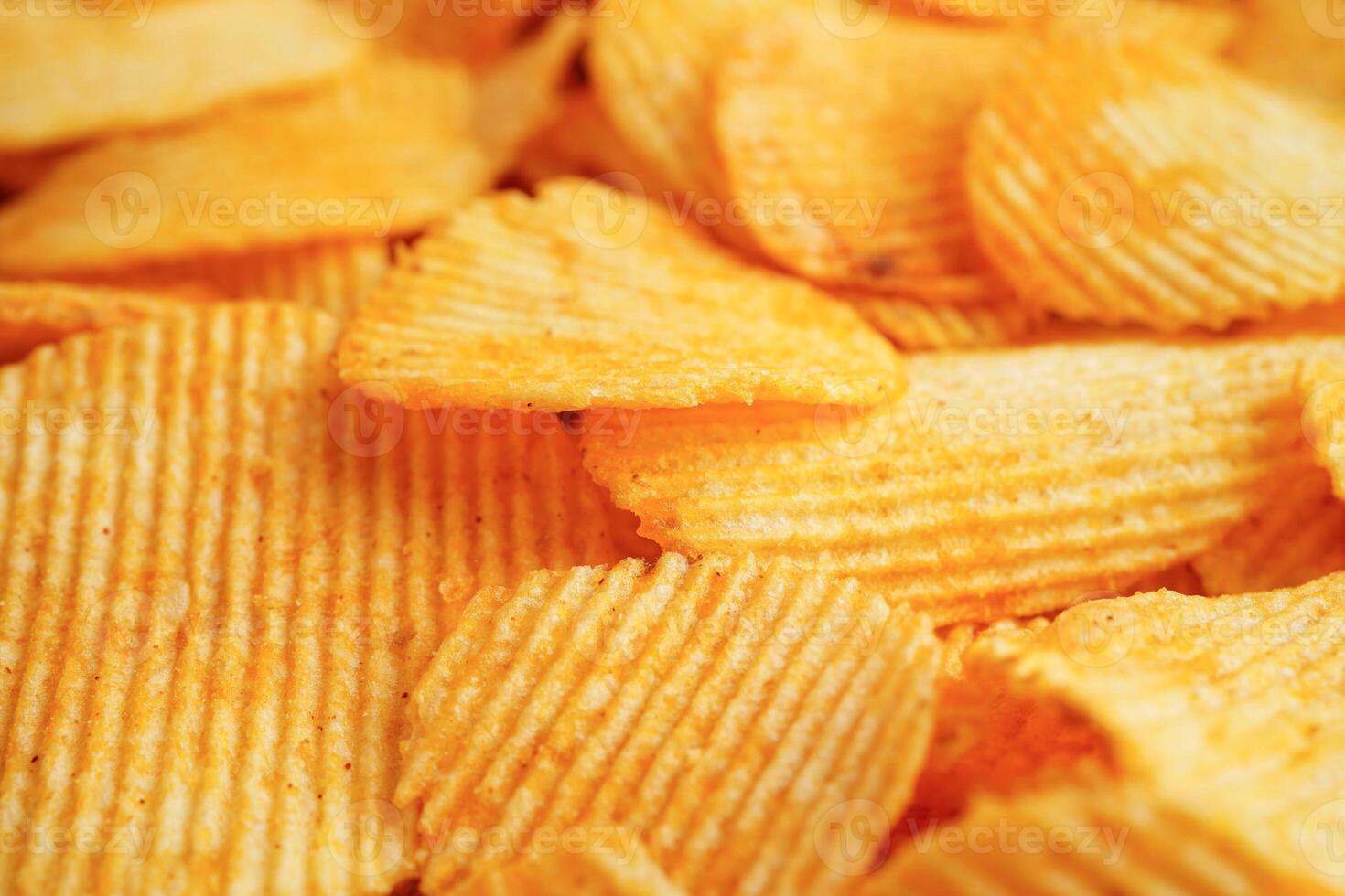 Potato chips , delicious BBQ seasoning spicy for crips, thin slice deep fried snack fast food. photo