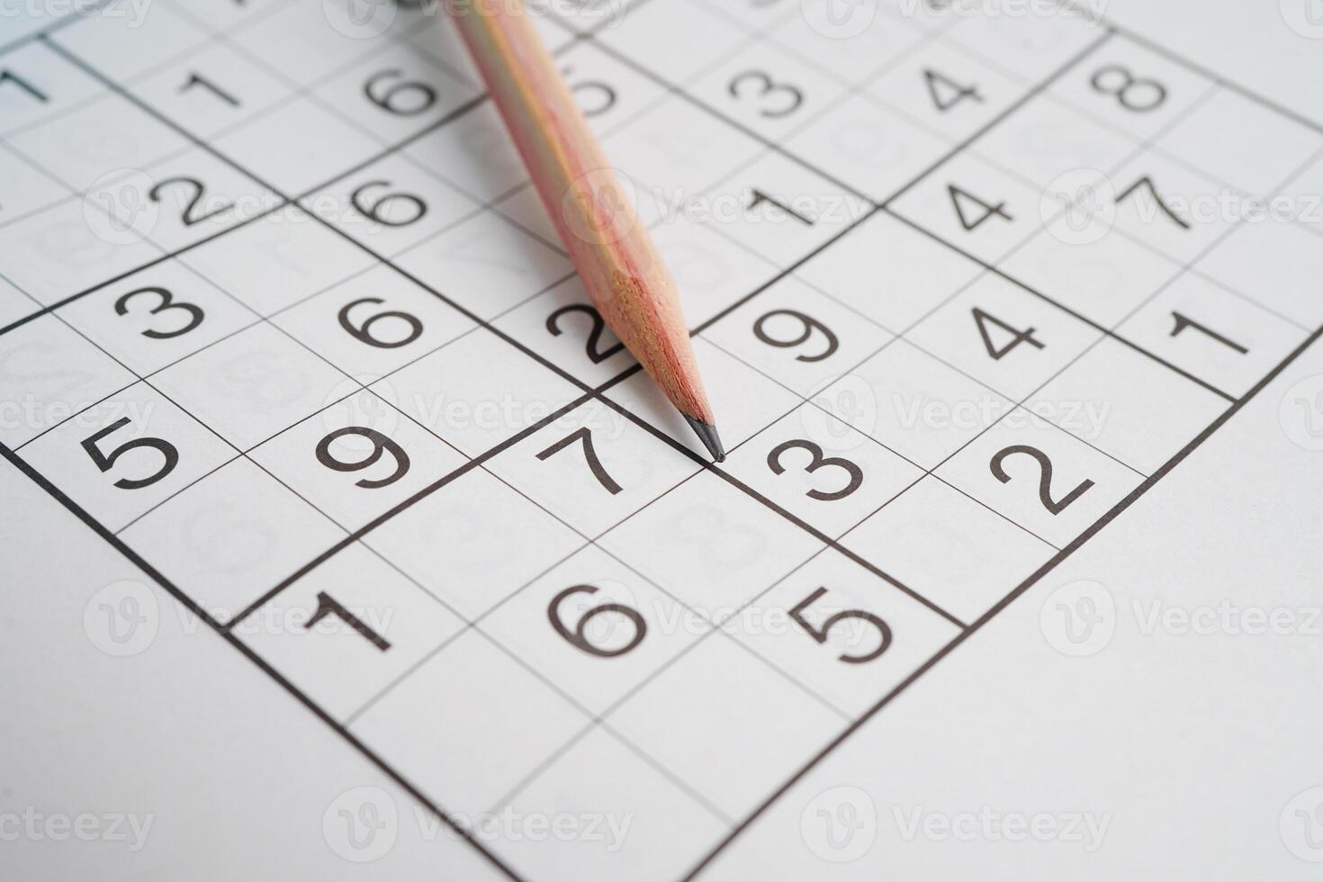 Sudoku puzzle, game to play for keep you brain younger for developing Alzheimer disease in senior patient. photo