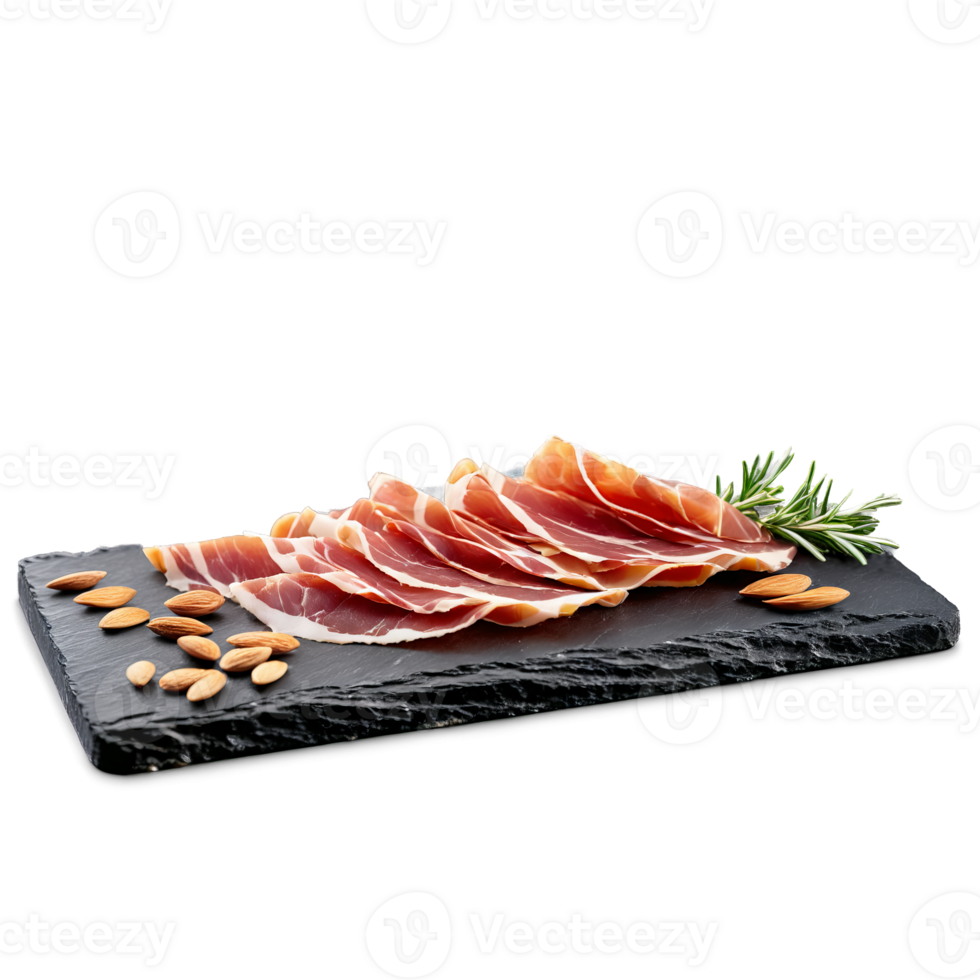 Jamon Iberico thinly sliced and artfully arranged on a slate board with a few almonds png