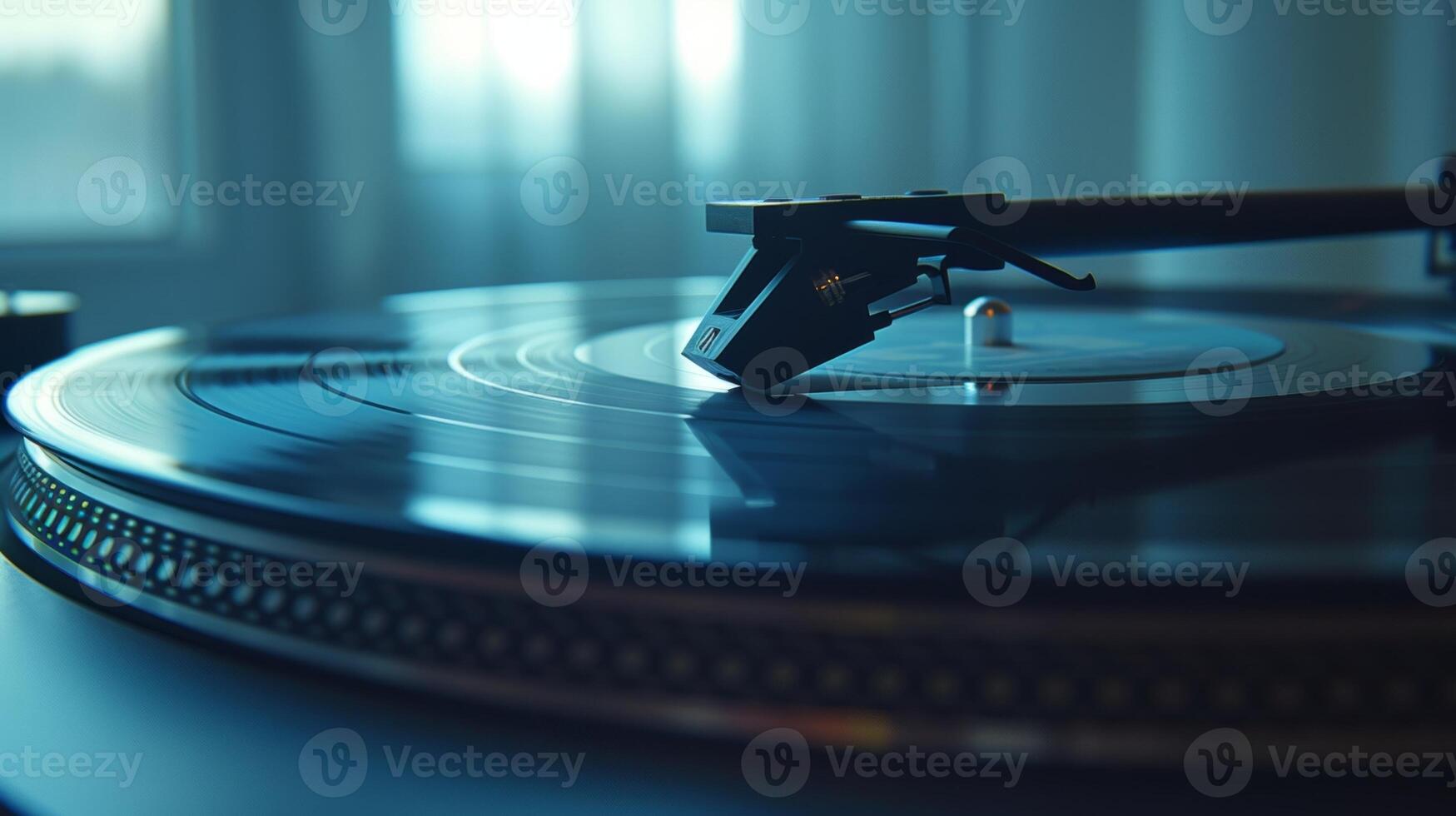 A record is delicately p onto a turntable ready to be brought to life by the finelycrafted stylus photo