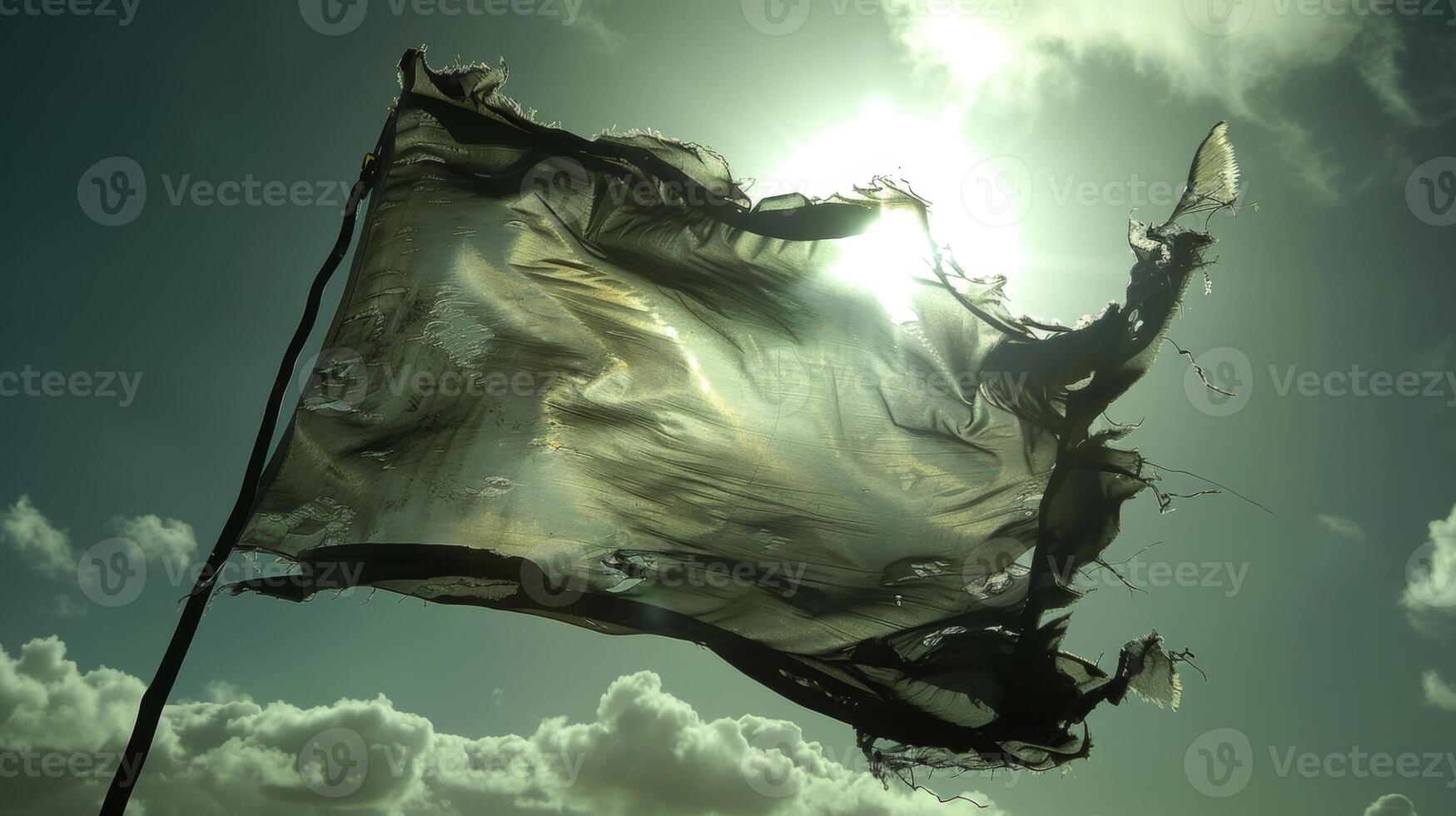 The tattered remains of a onceproud cavalry flag ripple in the wind a symbol of past glory now engulfed in tragedy photo