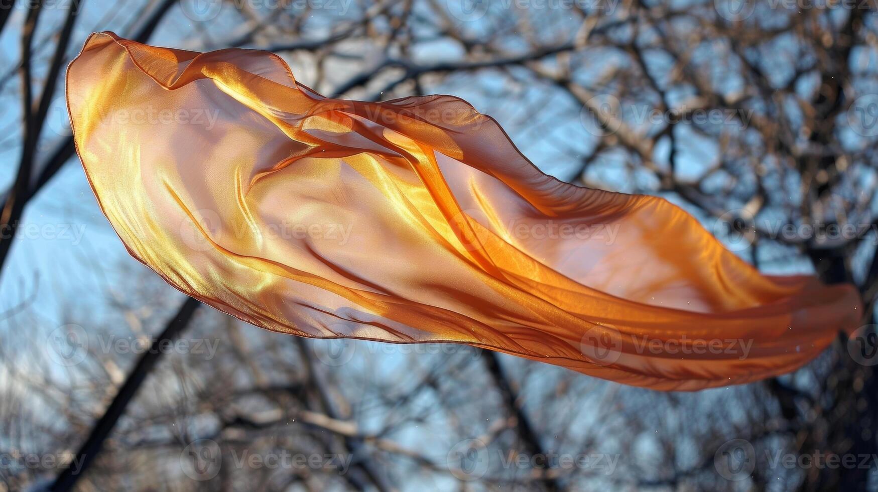 Against the cold crisp air the fabric seems to be reaching new heights with each gust of wind photo