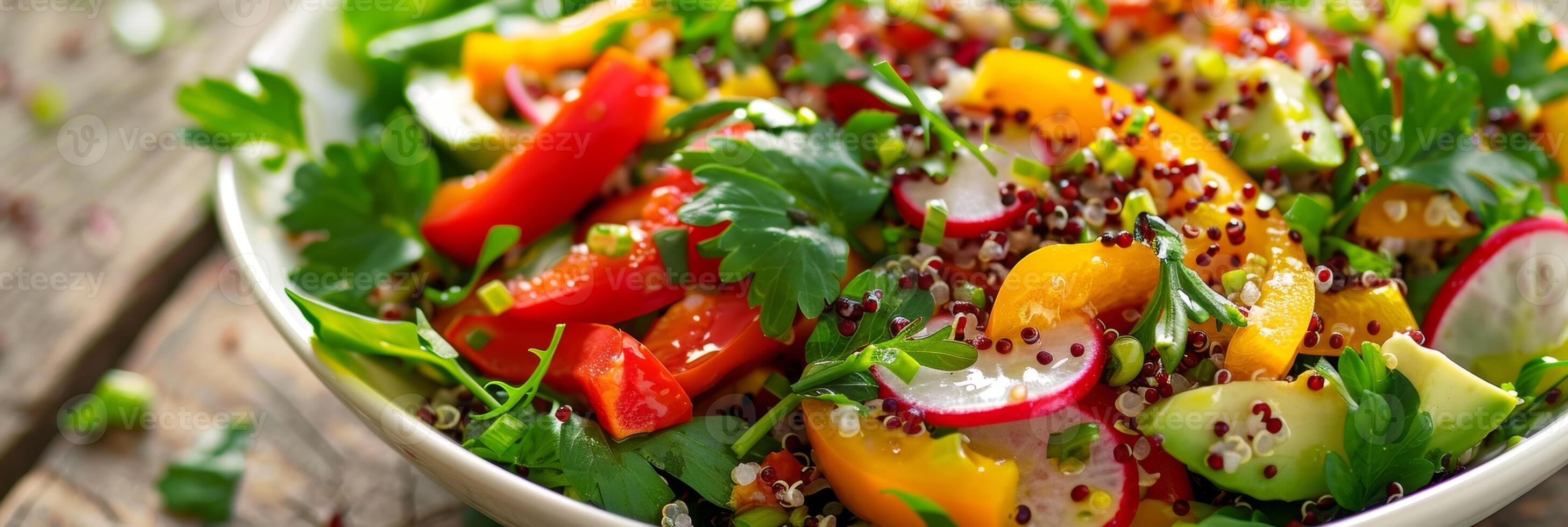 A herbinfused dressing featuring avocado oil pairing perfectly with a quinoa and vegetable salad photo