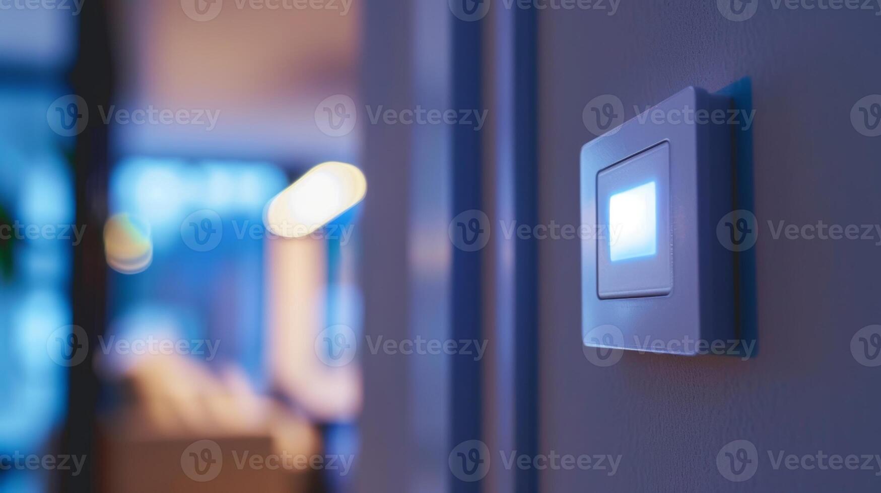 A closeup of a smart light switch with motion sensors automatically turning on lights when someone enters the room photo
