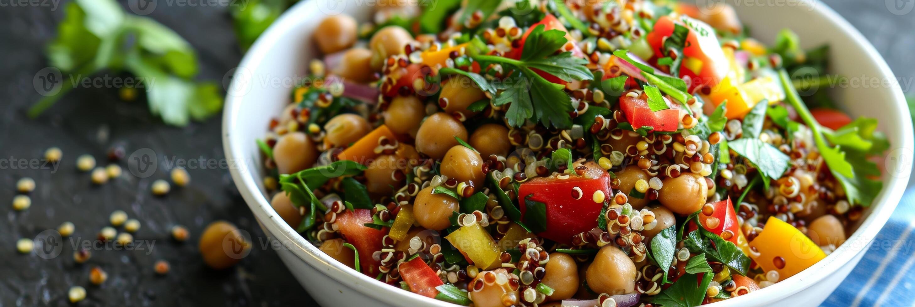 A colorful and nutritious buckwheat and chickpea salad with a quinoa and citrus vinaigrette dressing for a light and refreshing lunch photo