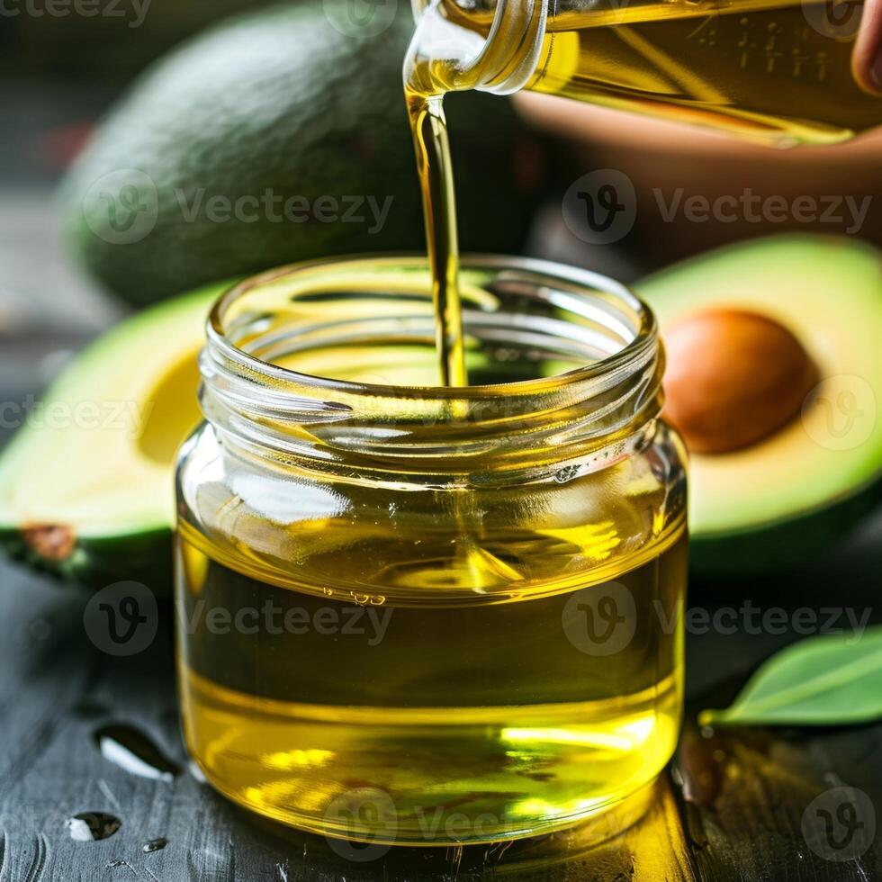 A label reading 100 Pure Avocado Oil High in Oleic Acid on a jar of avocado oil emphasizing its purity and nutritional value photo