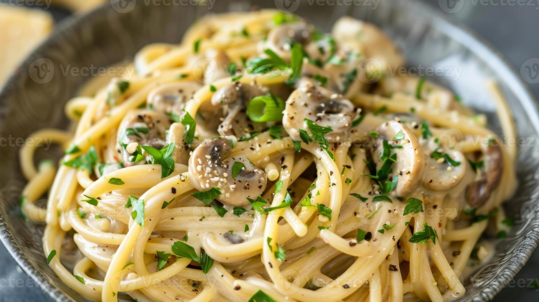 A creamy and savory pasta dish made with foraged nuts like cashews or macadamias to replace traditional dairy ingredients photo