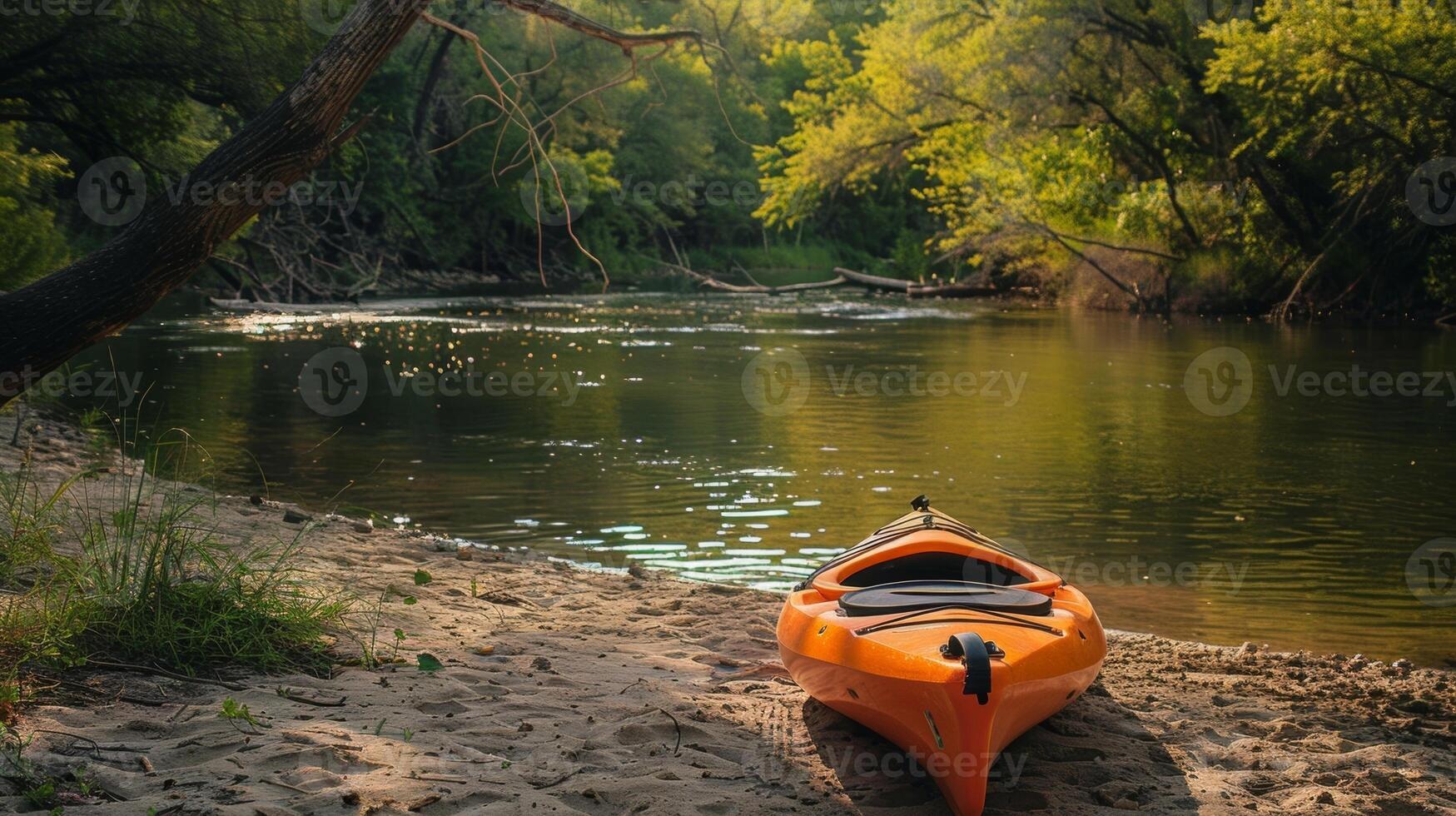 A kayak on the shore waiting for its turn to take a trip down the winding river photo