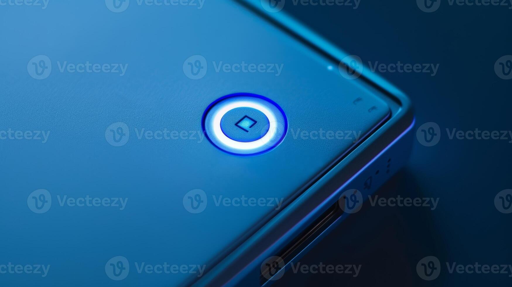The next photo highlights the power button on a slim power bank illuminated in a soft blue hue