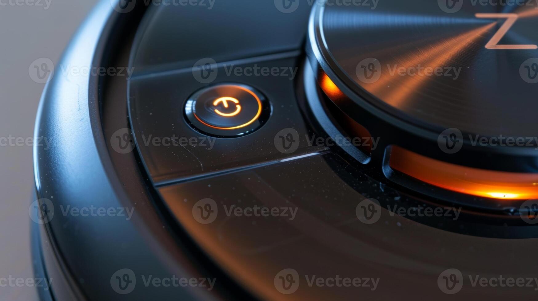 Closeup of the power button and indicator lights on a robot vacuum making it easy to operate and monitor during cleaning sessions photo