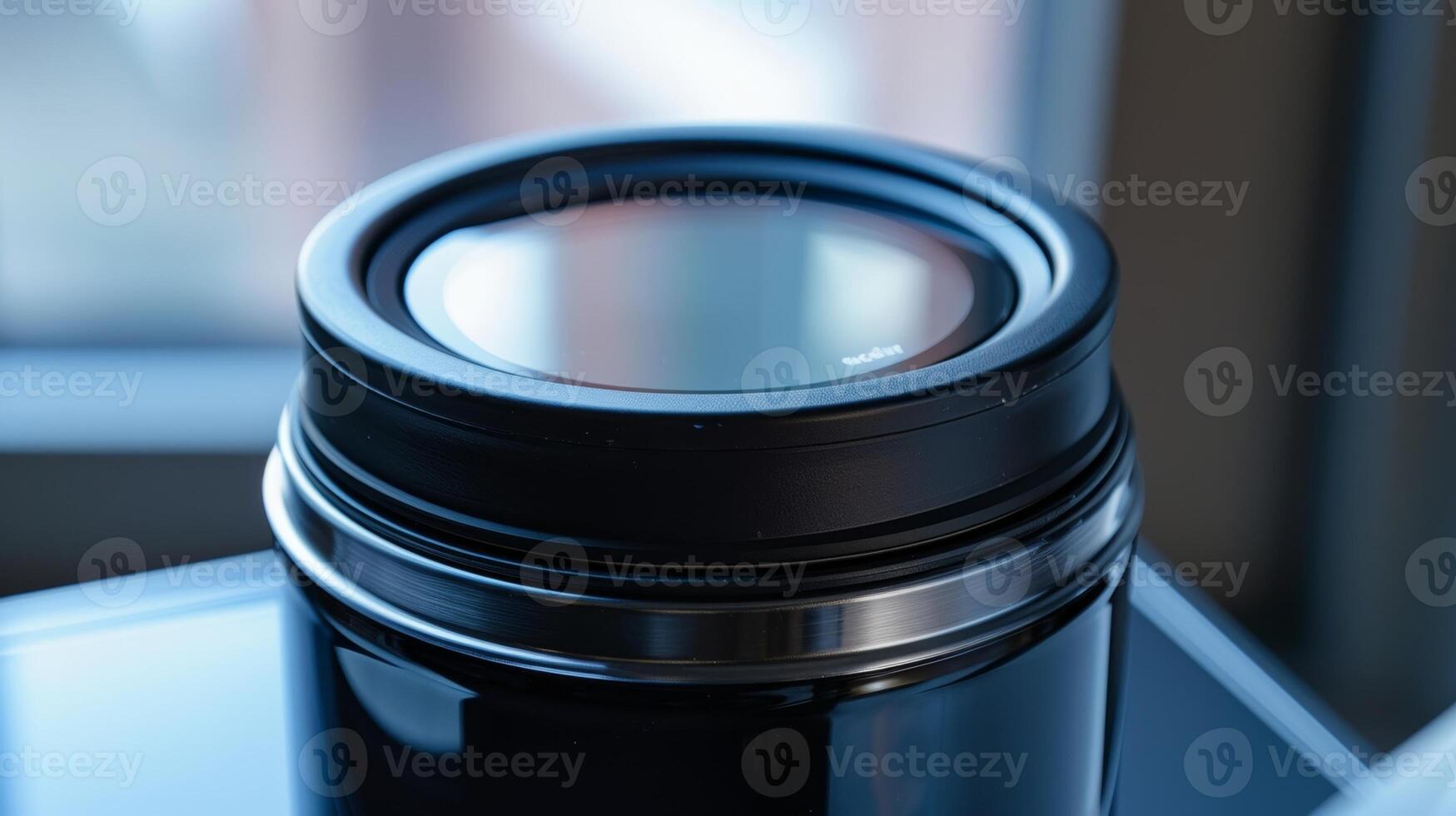 The lid of a smart thermos featuring a touch screen panel that allows for easy control of temperature and settings photo