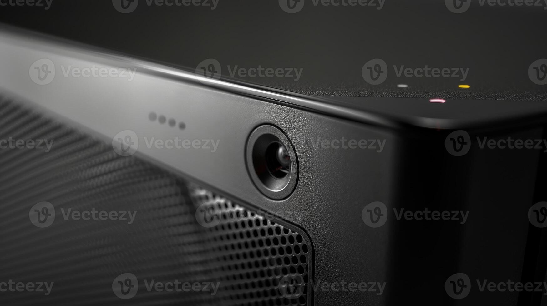 A closeup of the power button on the side of the projector indicating its accessibility and simplicity for onthego usage photo