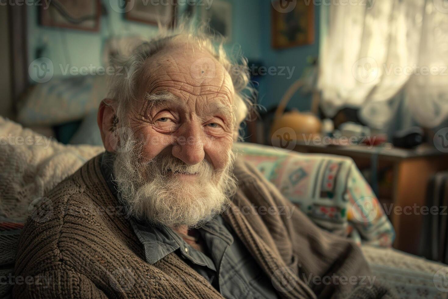 Indoor portrait of a smiling, bearded elderly man radiating warmth and joy photo