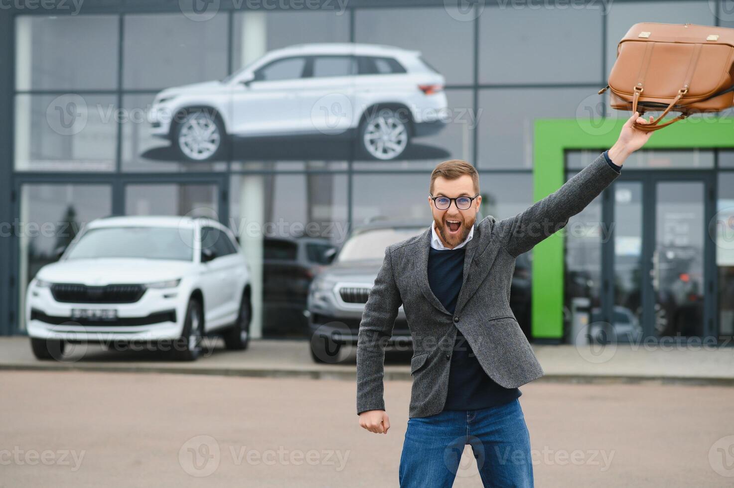 Man minded customer male buyer client in suit choose auto to go look aside want buy new automobile in car showroom vehicle salon dealership store motor show indoor Sales concept photo