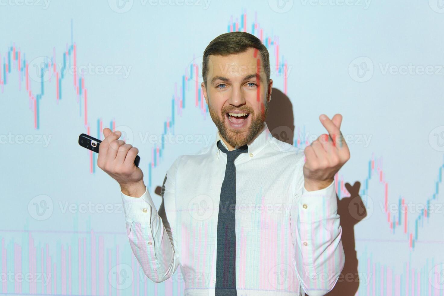 Portrait of concerned European businessman thinking in blurry office with double exposure of falling financial chart. Concept of crisis and stock market. photo