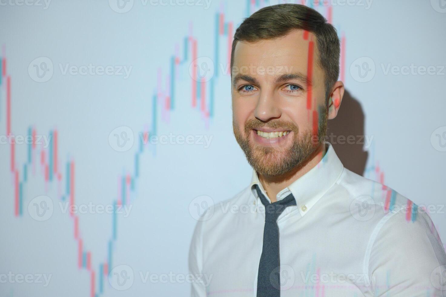 Portrait of concerned European businessman thinking in blurry office with double exposure of falling financial chart. Concept of crisis and stock market. photo