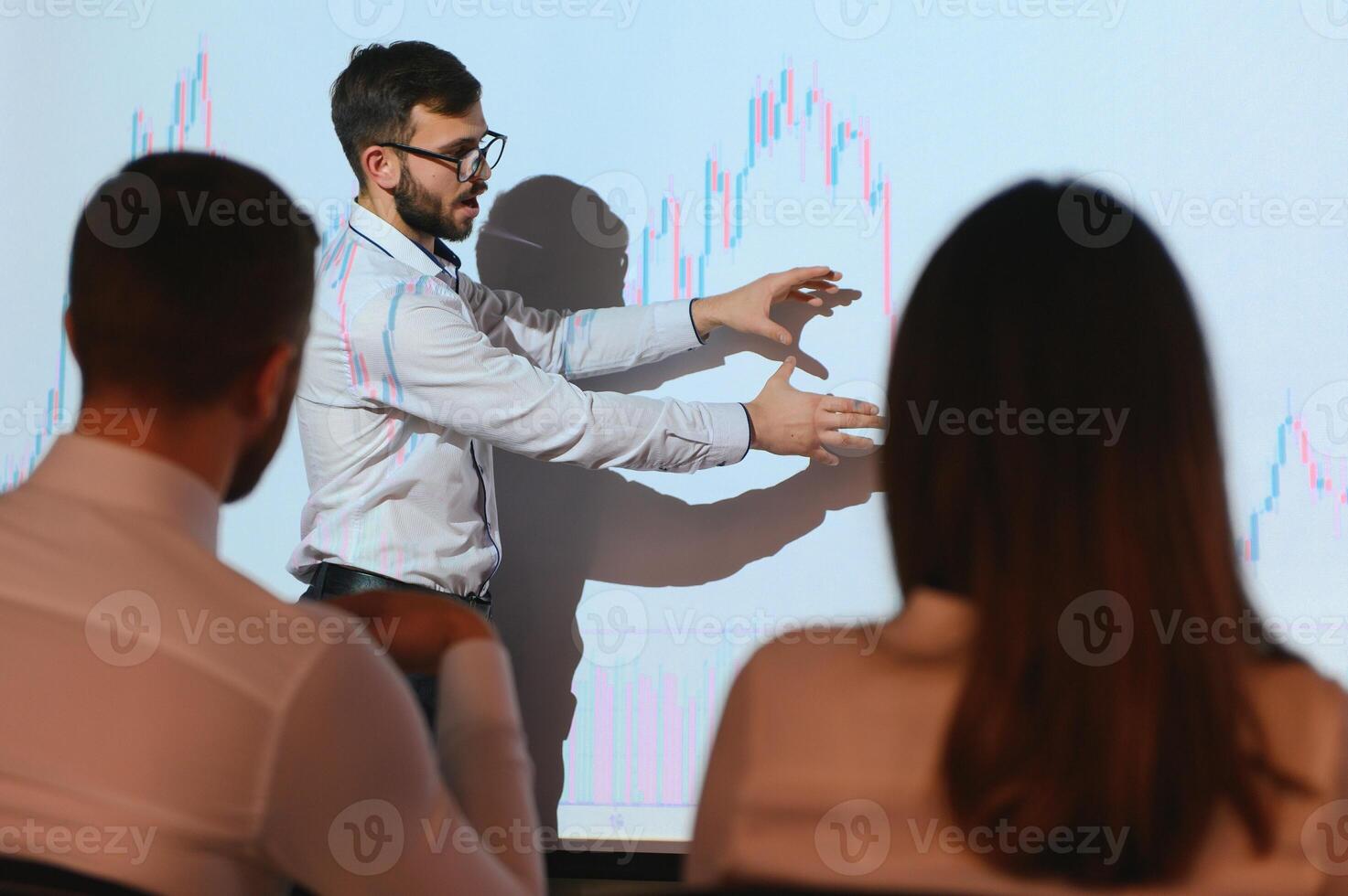 Analyzing data, graphs and reports for investment purposes. Creative teamwork traders. photo
