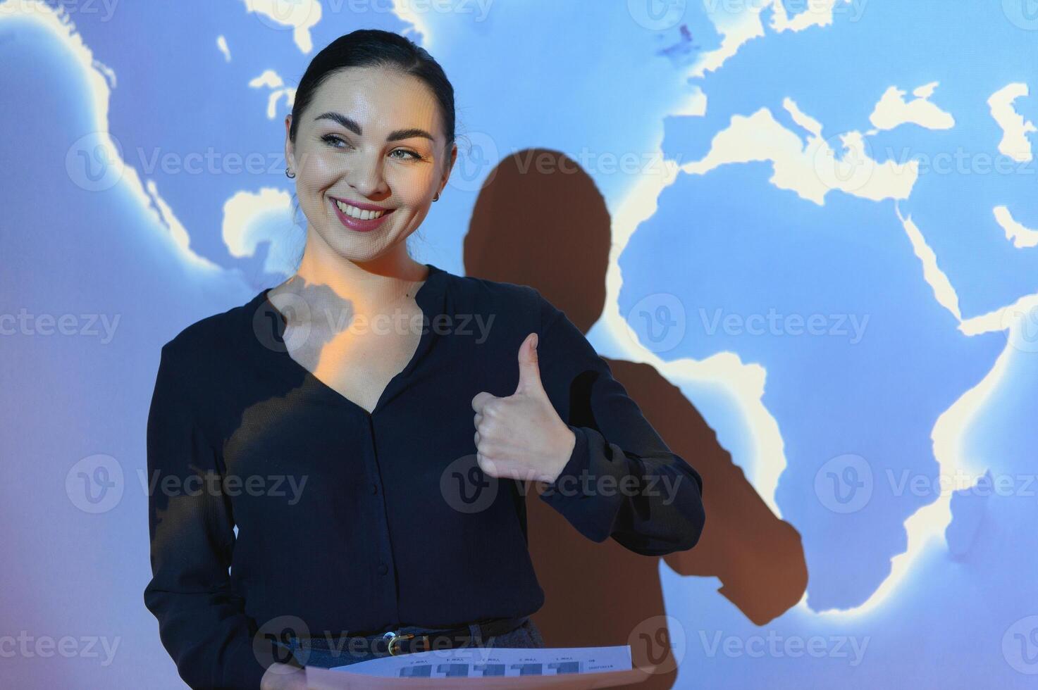 Buinesswoman with world map background photo