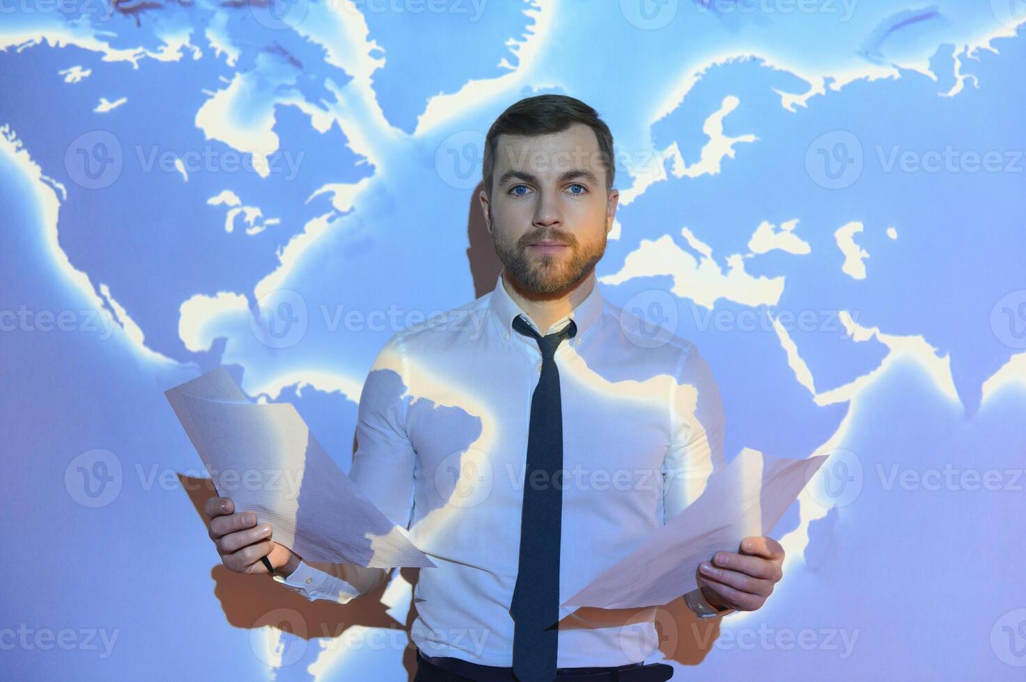 businessman on the background of the world map, international economy. photo