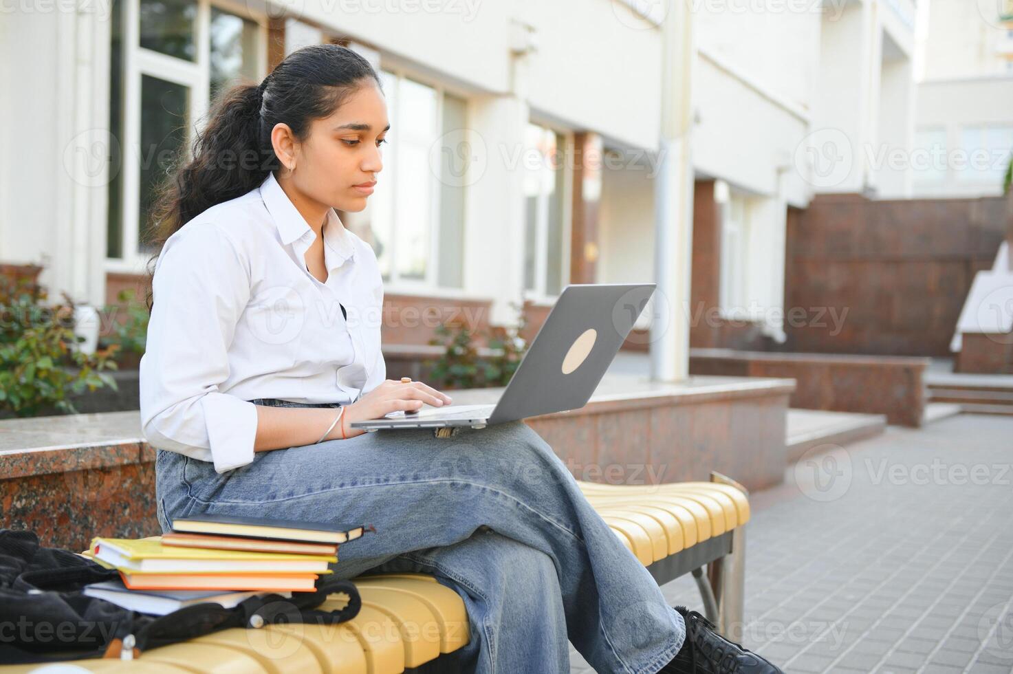 pretty indian college girl at the University photo