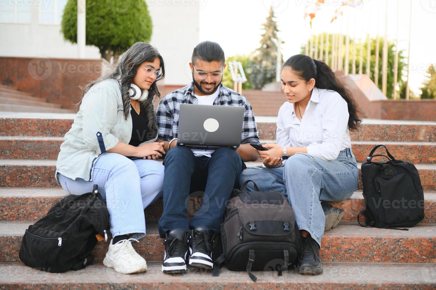 Group of Indian or Asian college students in the campus photo