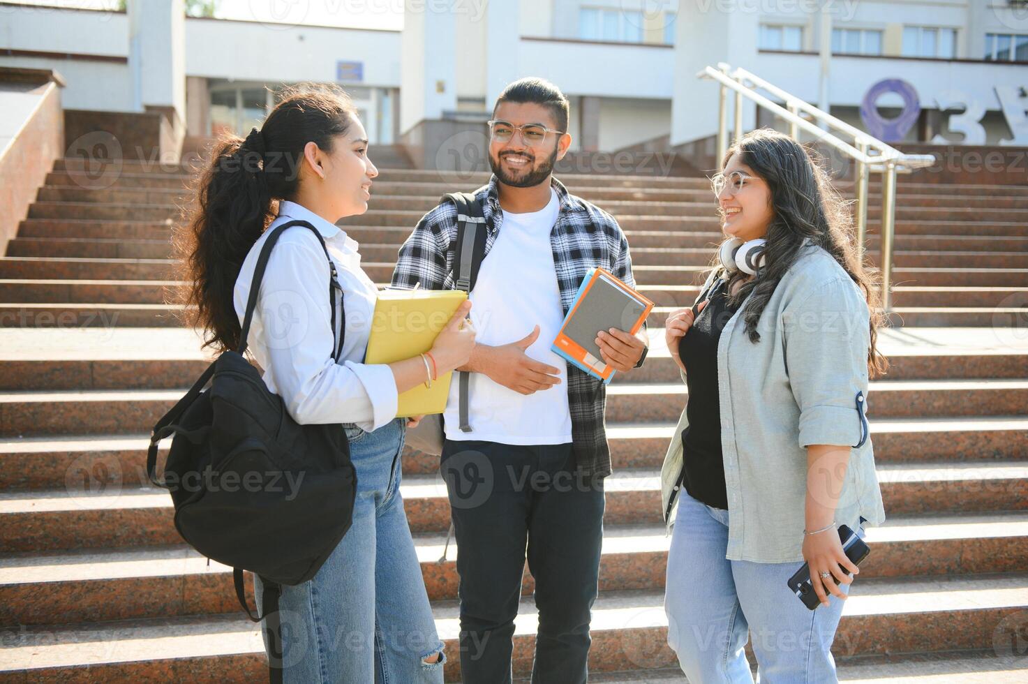 Group of Indian or Asian college students in the campus photo