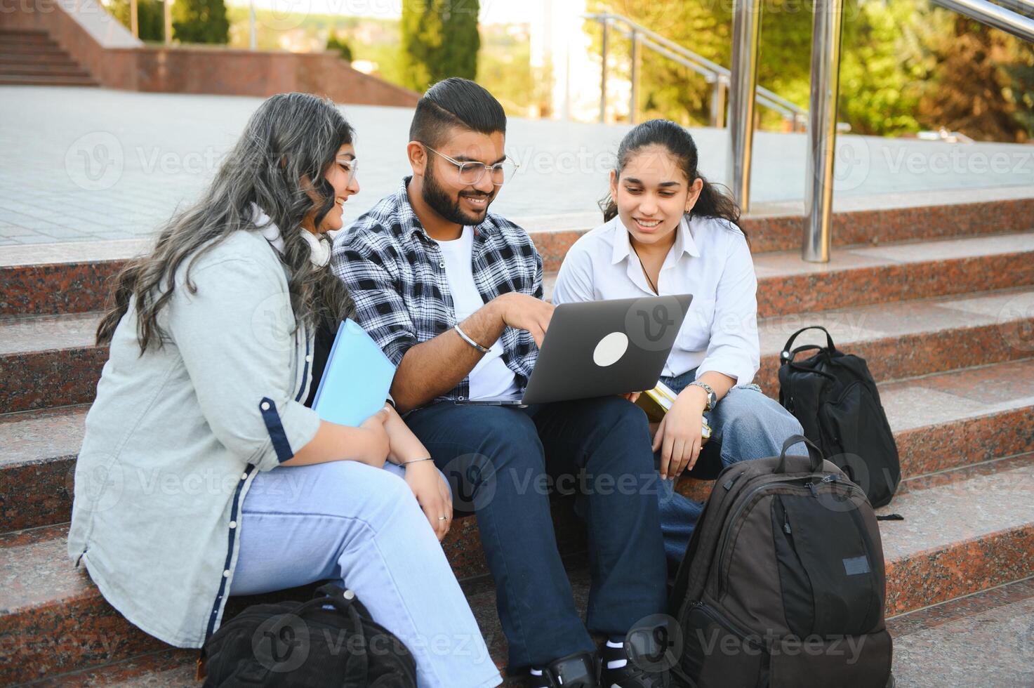 Group of Indian or Asian college students in the campus photo