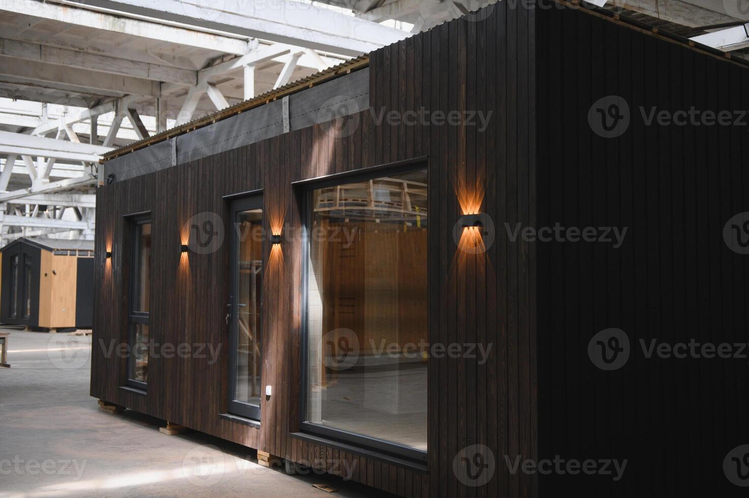 A new wooden modular prefabricated house inside in manufacturing facility photo