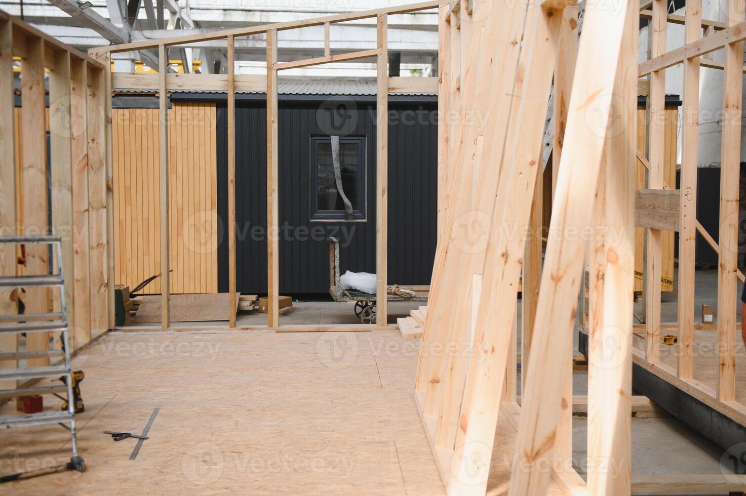 Production of new wooden modular houses. Construction site photo