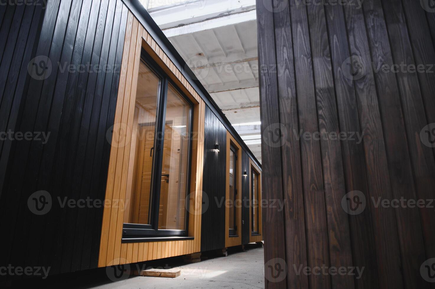 A new wooden modular prefabricated house inside in manufacturing facility photo