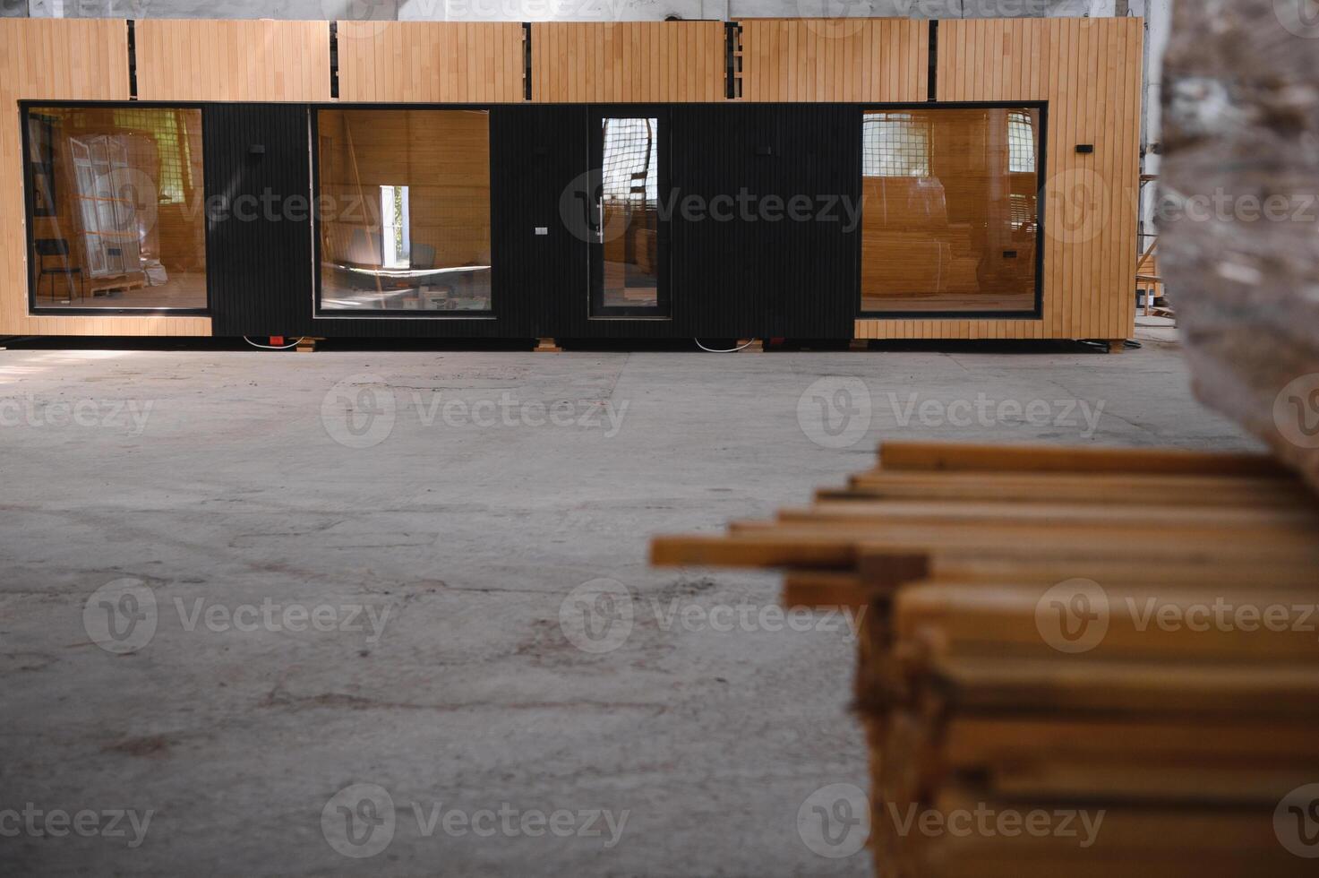 A new wooden modular prefabricated house inside in manufacturing facility photo