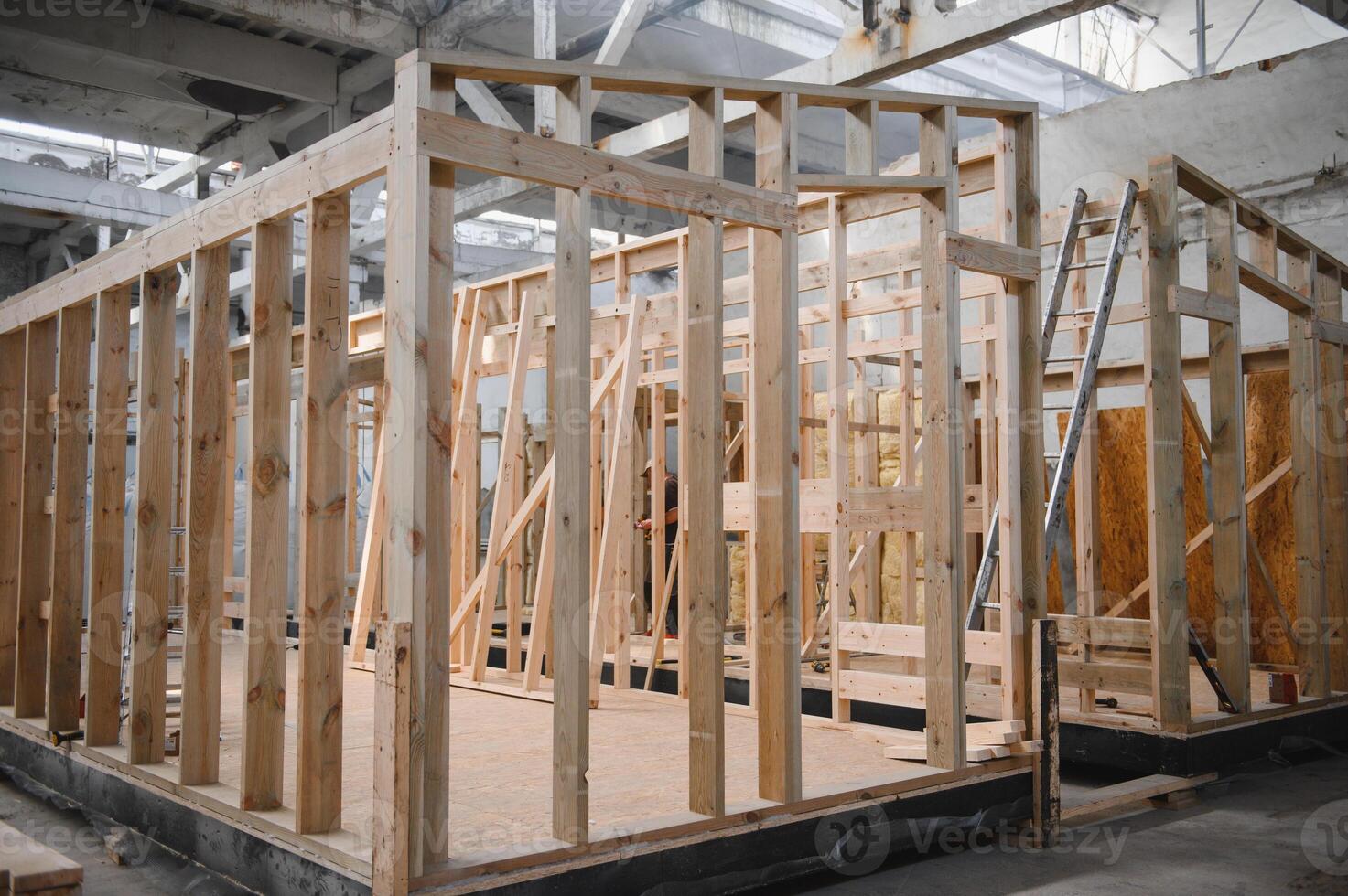 Production of new wooden modular houses. Construction site photo