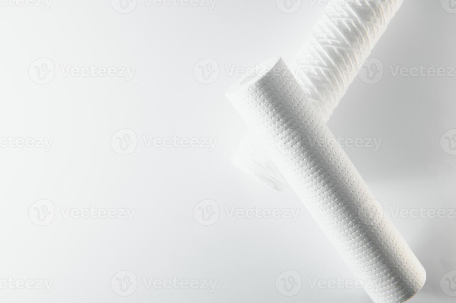 filter cartridges for water on a white background. Installation of reverse osmosis water purification system. photo