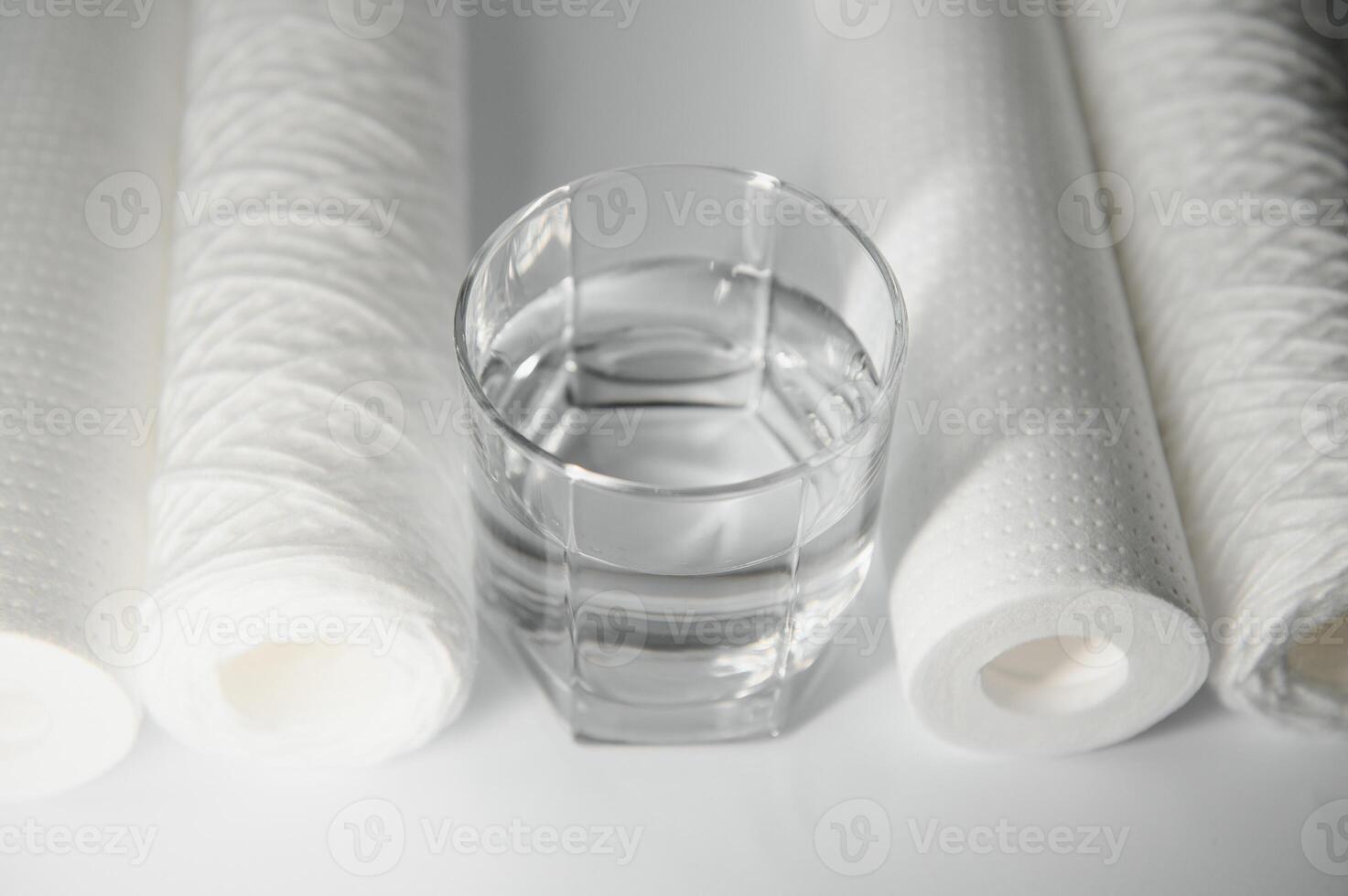 filter cartridges for water on a white background. Installation of reverse osmosis water purification system. photo