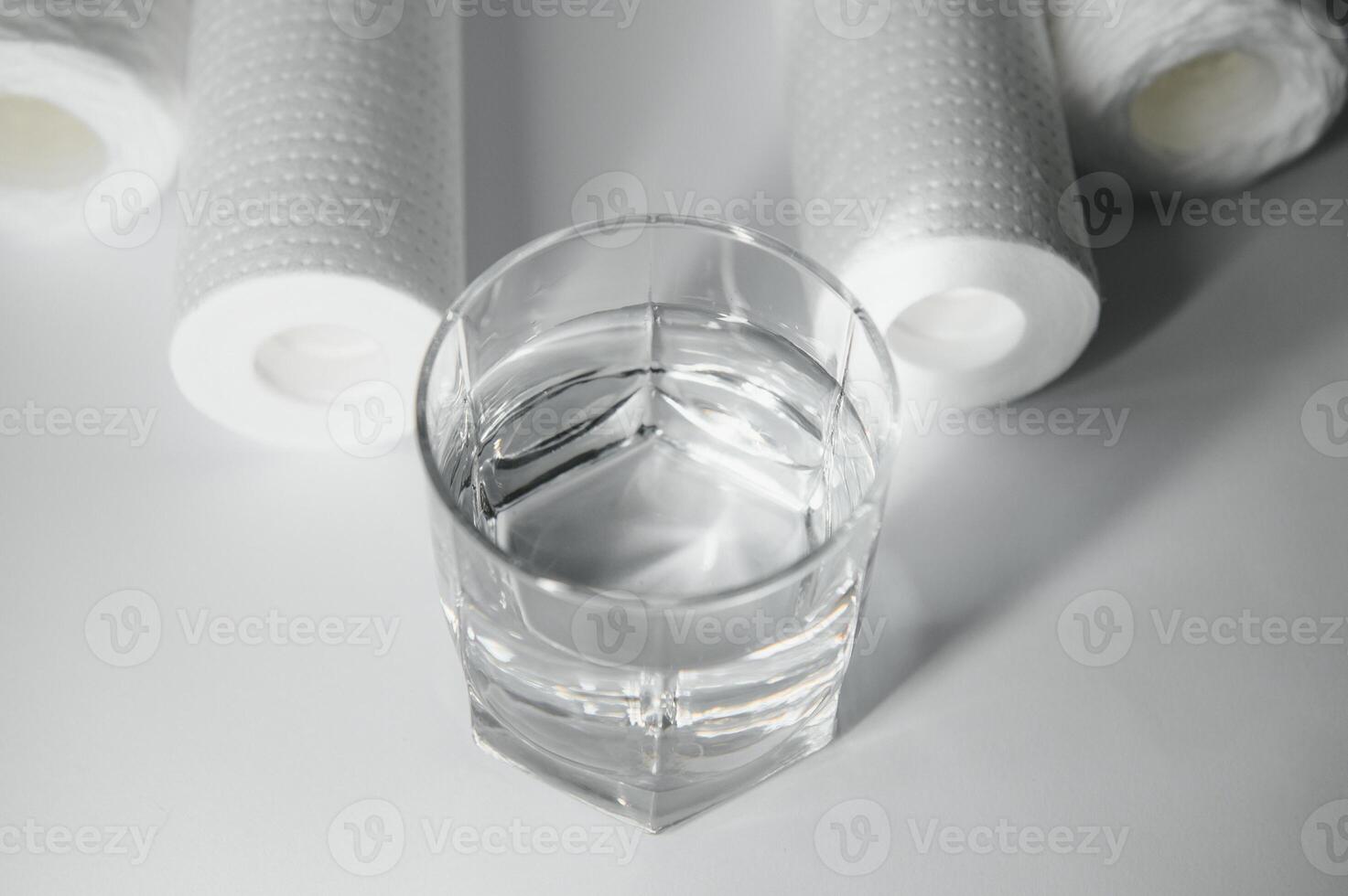 filter cartridges for water on a white background. Installation of reverse osmosis water purification system. photo