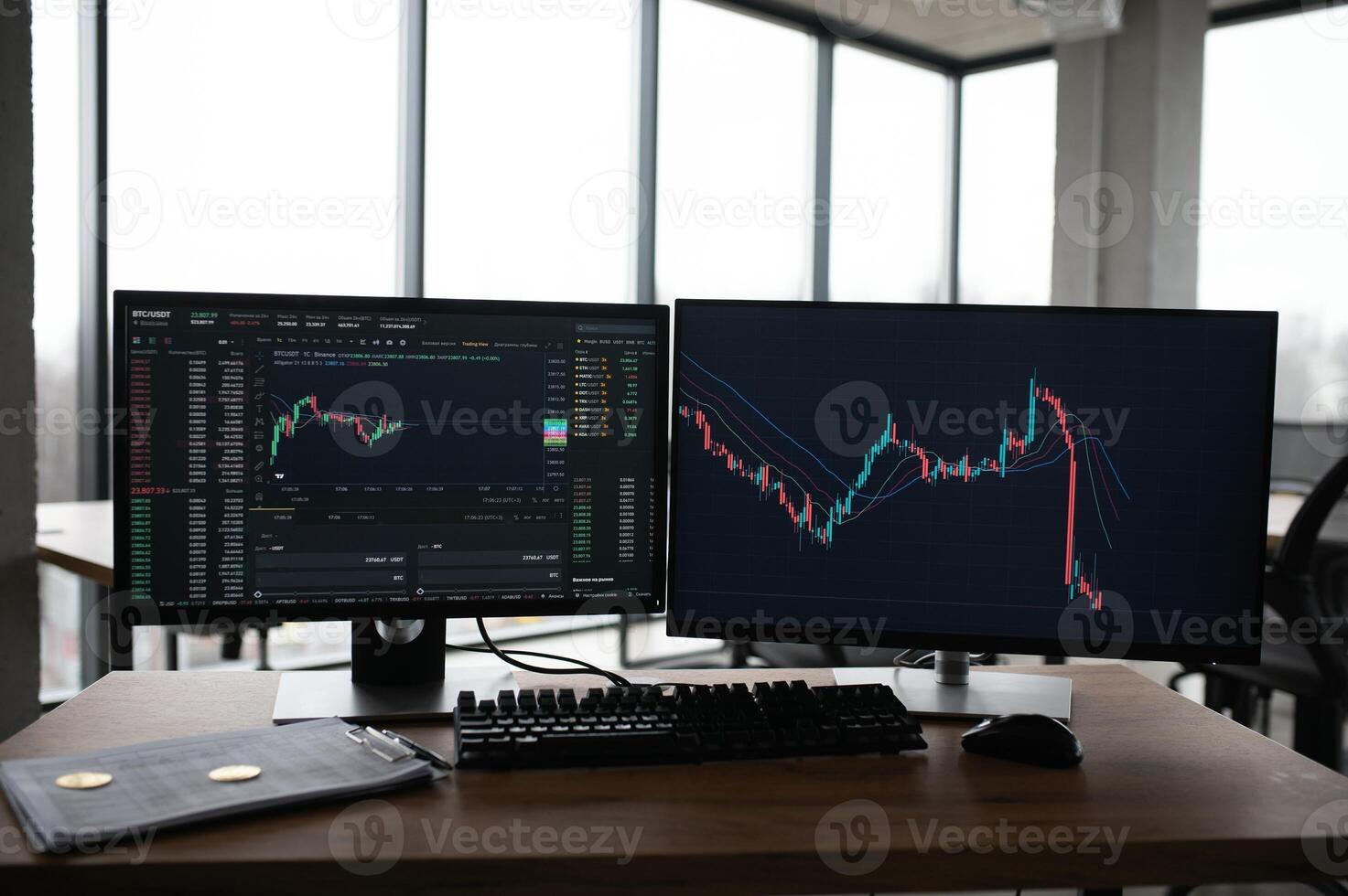 Close Up Shot of a Computer Monitor Screen with Real-Time Stocks, Commodities and Exchange Market Charts and Tickers on a Multi-Display Workstation in a Financial Business Office. photo