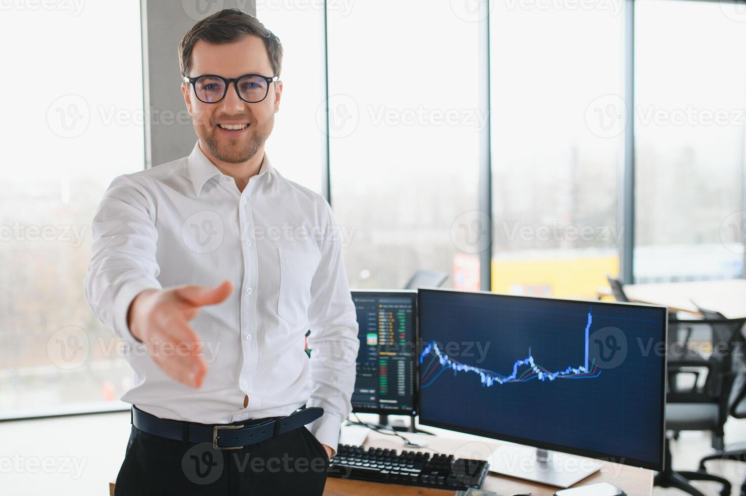 Successful trader in formalwear checking cryptocurrency information data on finance market graph, working in office photo