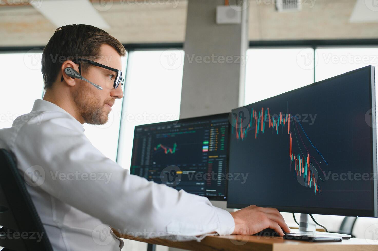 Serious business man trader analyst looking at computer monitor, investor broker analyzing indexes, financial chart trading online investment data on cryptocurrency stock market graph on pc screen. photo