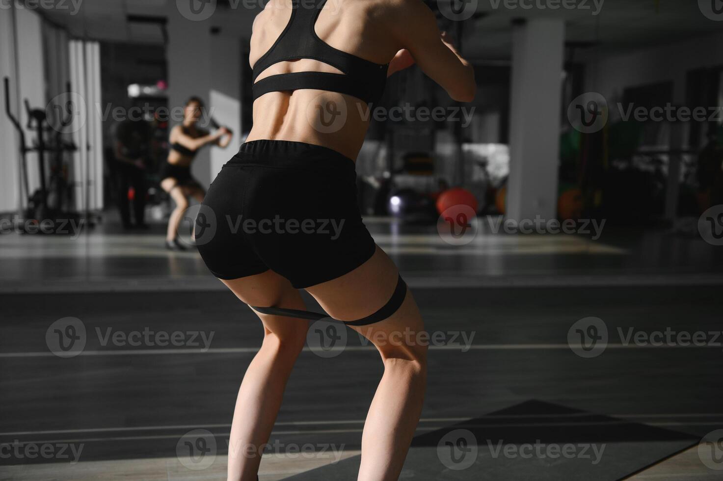 Close up image of attractive fit woman in gym. photo