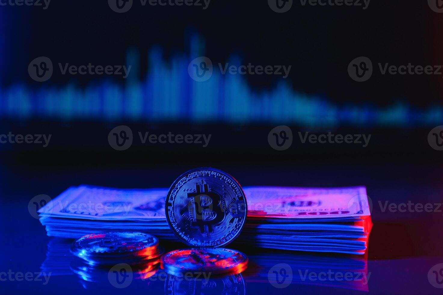 A symbolic coins of bitcoin on banknotes of dollars. Exchange bitcoin cash for a dollar. photo