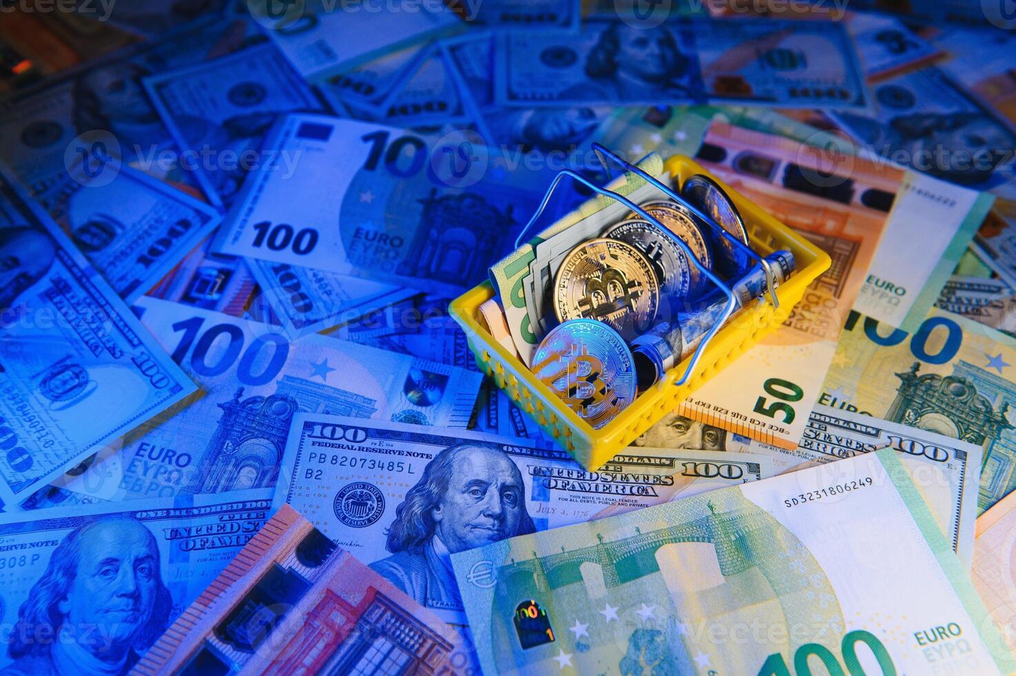 golden bitcoins new virtual currency with traditional dollars and euro as a background photo