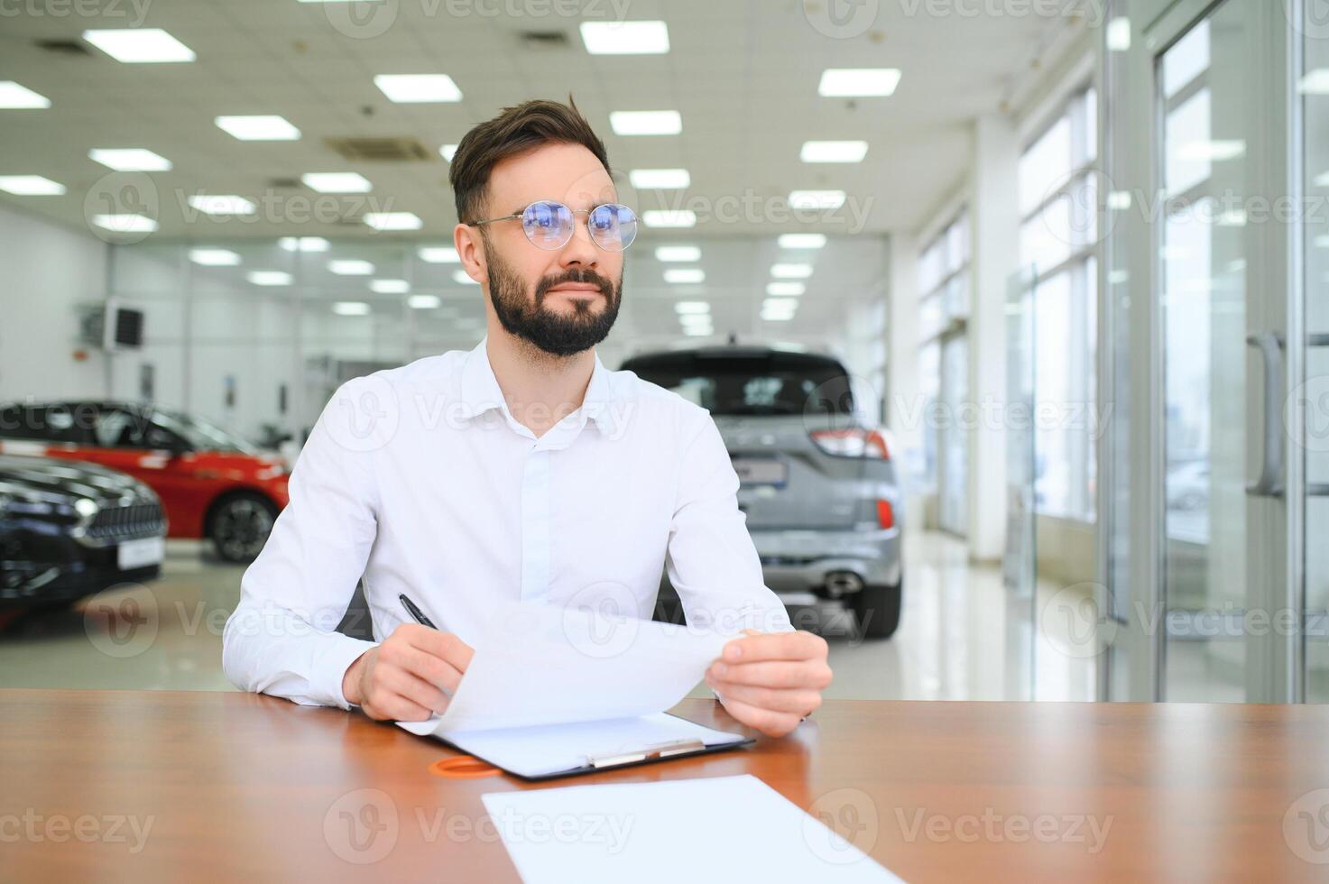 I have a new car. client signing car lease form. photo