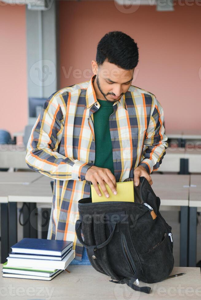 Handsome and young indian Male college student. photo