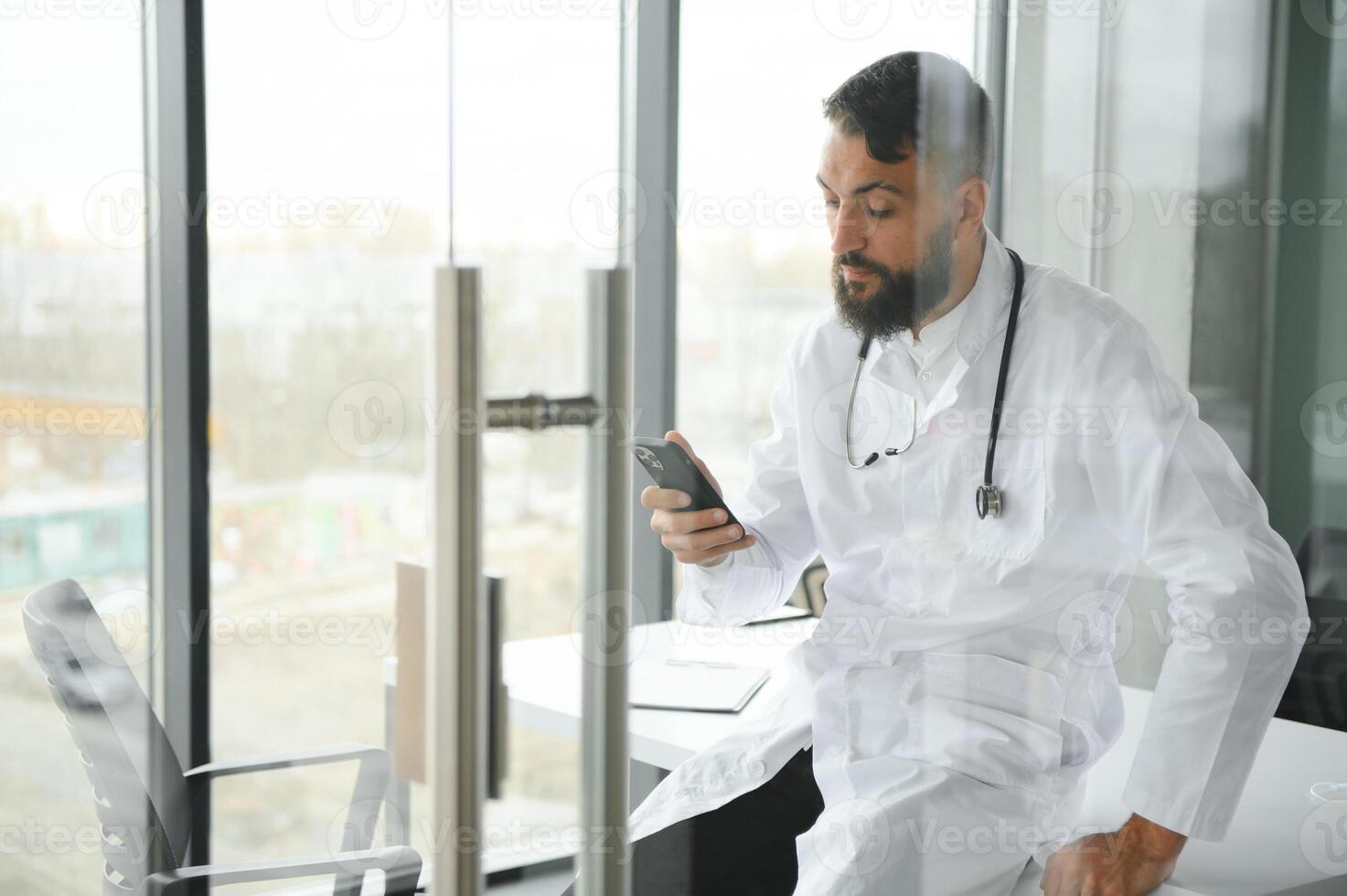Portrait of a young Arab doctor in the clinic. Healthcare concept photo